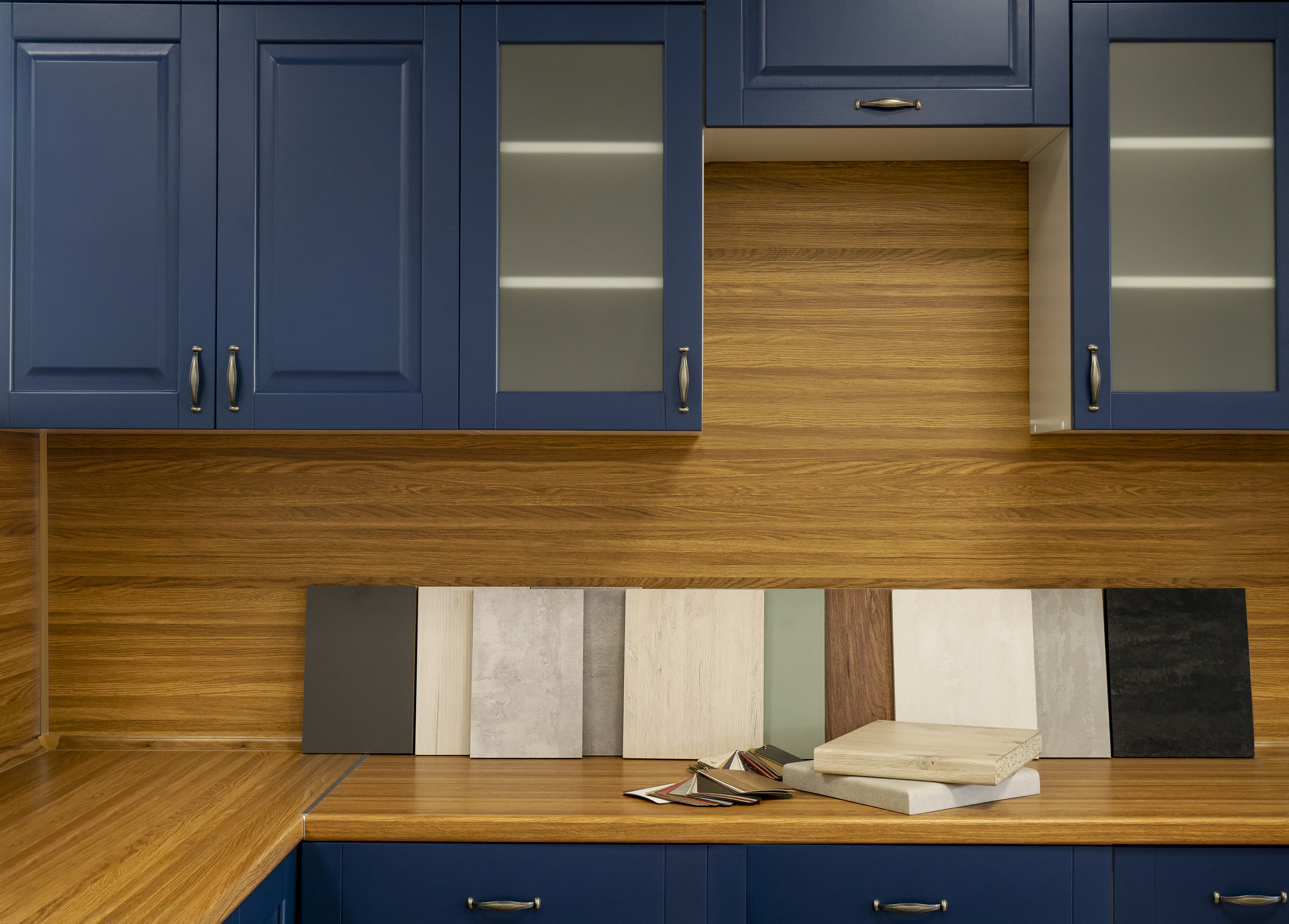 Furniture production. Catalog of samples of materials for kitchen countertops, facades made of artificial stone, plastic, laminate and chipboard.